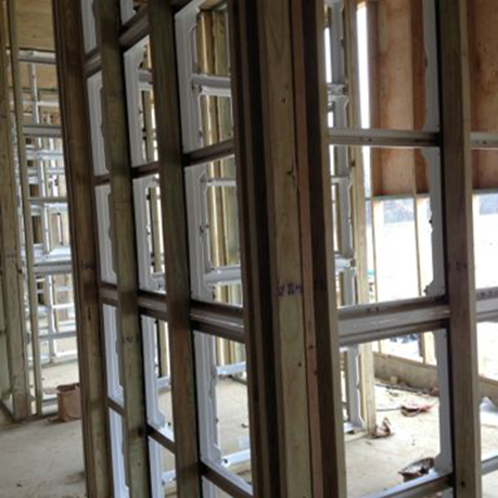 Filter grids set into the dormer framing during a retrofit